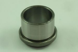 A cylindrical metal cup with a smooth surface, slightly reflective, and a small ridge near the base. It rests on a plain white background.